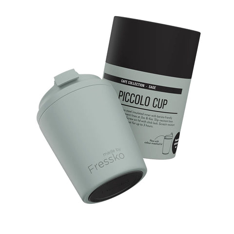 Piccolo cup with packaging on a white background