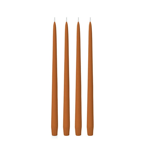 Four 25cm baked clay candles on a white background