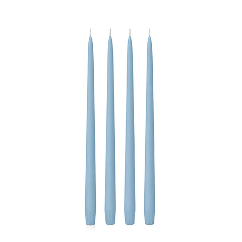 Four light blue 25cm candles on a white background