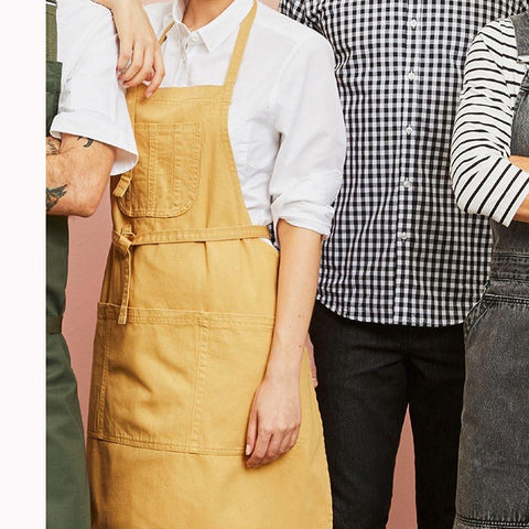 Person wearing a yellow apron on a white background Boston Cotton Drill Unisex Apron Mustard by Cargo Crew
