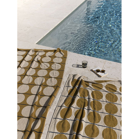 Towel with circular pattern on a white background