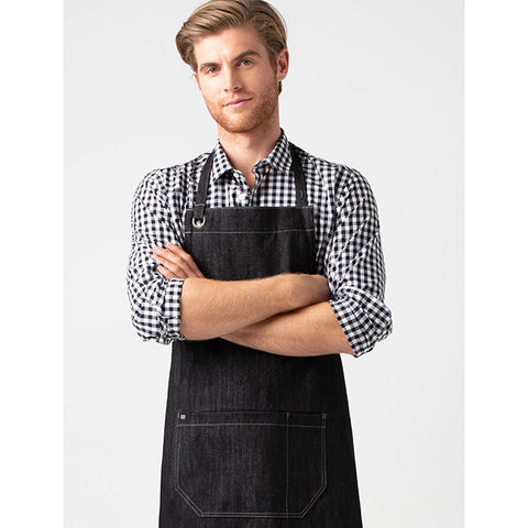 Black denim apron with features highlighted on a white background Harvest Unisex Bib Apron Black by Cargo Crew
