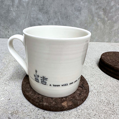 A stack of Dark Round Cork Coaster by Heaven In Earth
