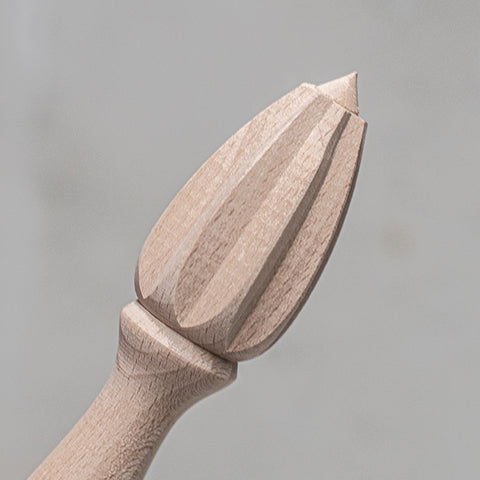 Wooden Citrus Squeezer/Reamer by Heaven In Earth with limes