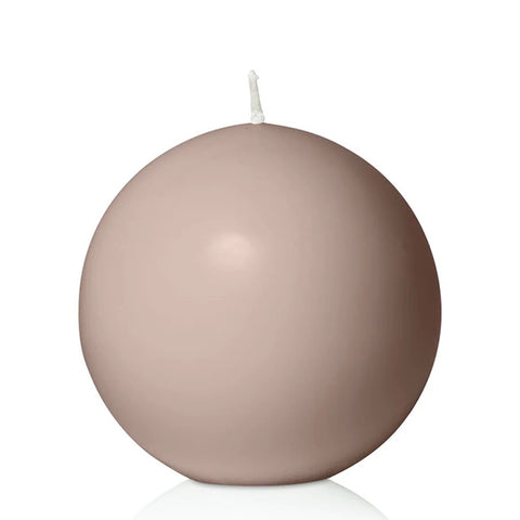 pink sphere candle on white background