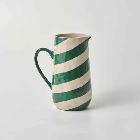 Cabana Stripe Jug in Green by Jones & Co with pink flowers in it