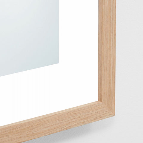 framed photographic image of two Kookaburras on a tree branch on a grey background