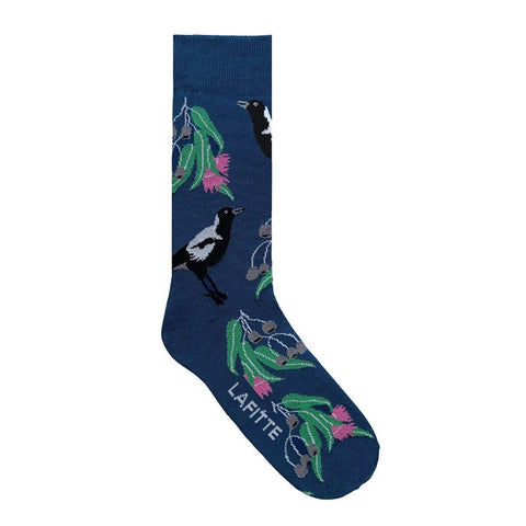 Navy sock with magpie and floral design on a white background