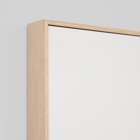 Framed artwork of a thatched-roof structure with surfboards against a light background