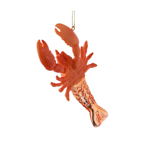 Red lobster ornament on a white background