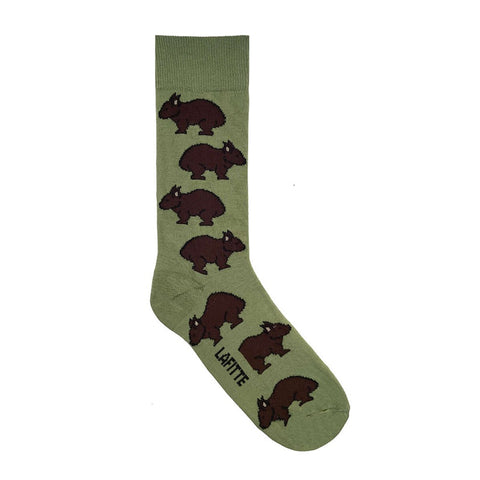 Green sock with brown wombat illustrations on a white background
