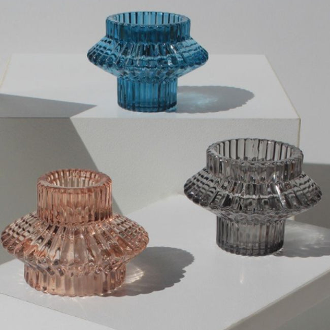 group of textured Glass Candle Holders on a white background